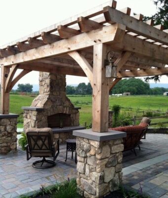 outdoor fireplace with a pergola