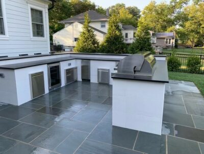 White tiled outdoor kitchen made with Stone Age modular panels