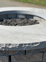 Close up of Natural Stone Fire Pit Cap
